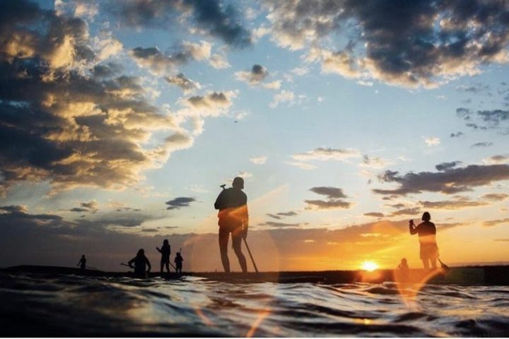 paddling under the full moon