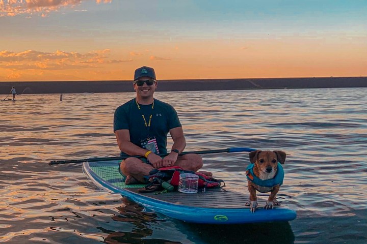 a man on a boat in the water