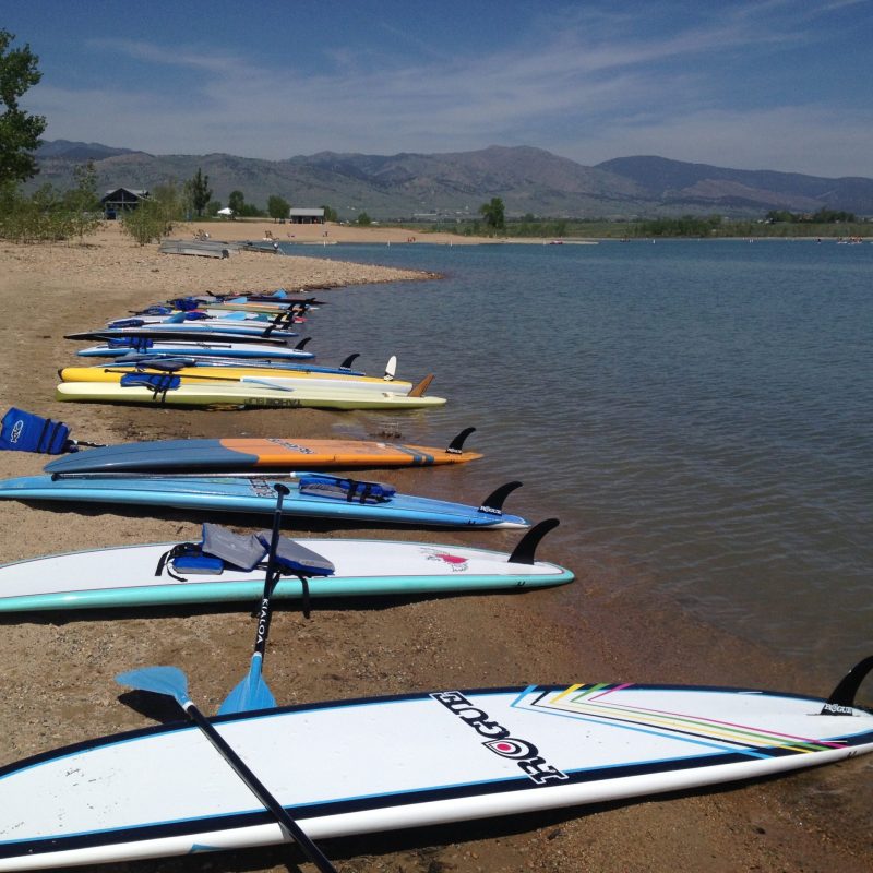 a boat sitting on top of a beach