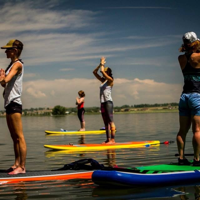 a group of people on a beach