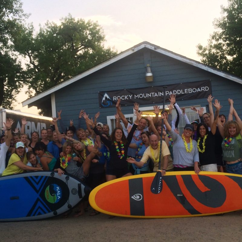 a group of people standing in front of a building