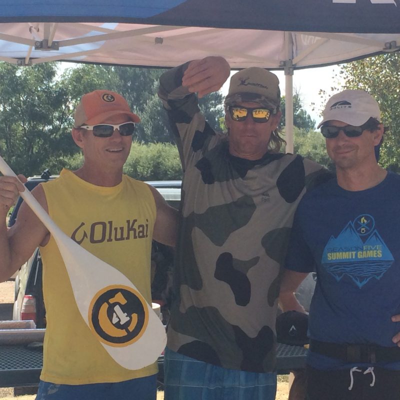 a group of people holding a sign