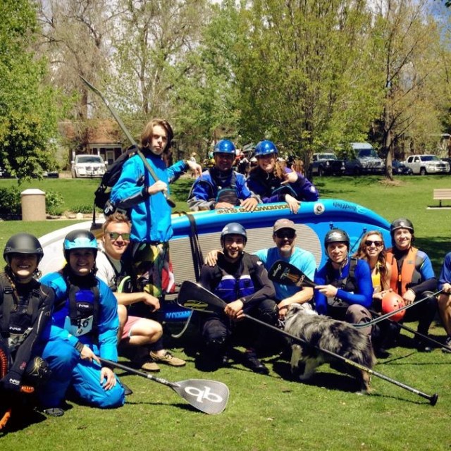 a group of people sitting at a park