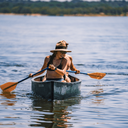 a small boat in a body of water