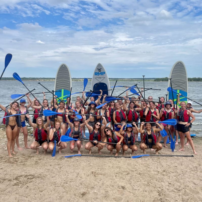 a group of people on a beach